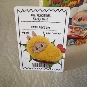 Yellow Pom Creature Pin on The Monsters Card